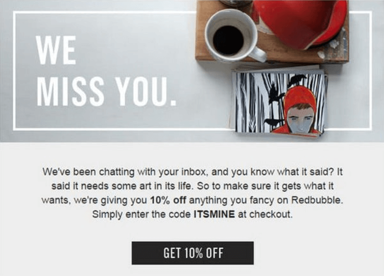 Re-engagement email from Redbubble with the headline “We miss you,” offering 10% off with code ITSMINE and featuring coffee, a red bowl, and a book with modern art.